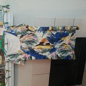 Short sleeve floral print dress. It's knee length.